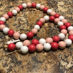 Pink white and red wooden beads
